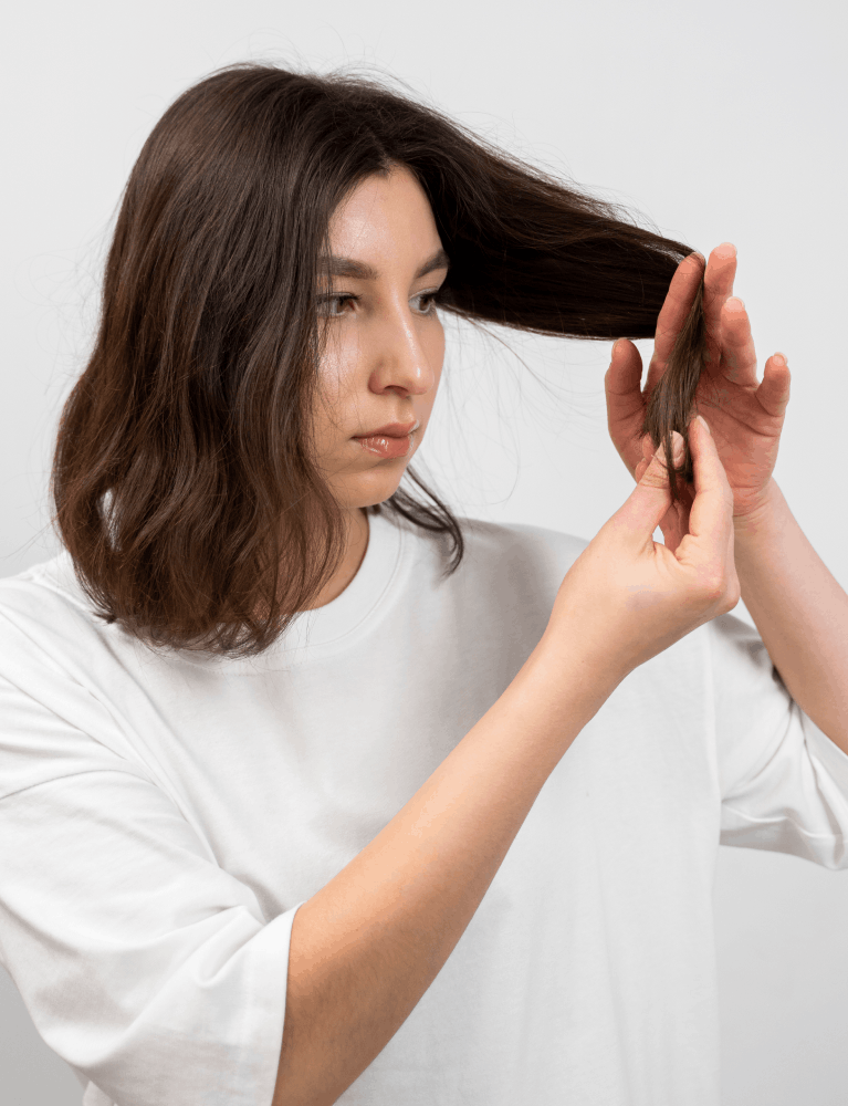Dermatologist providing treatment for reduced hair density and hair thinning at a skin and hair clinic in Chennai.