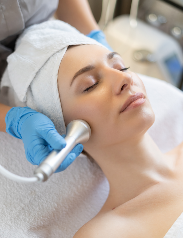 Dermatologist performing Microdermabrasion Treatment in Chennai to exfoliate dead skin cells, improve skin texture, reduce acne scars, and restore a healthy glow.