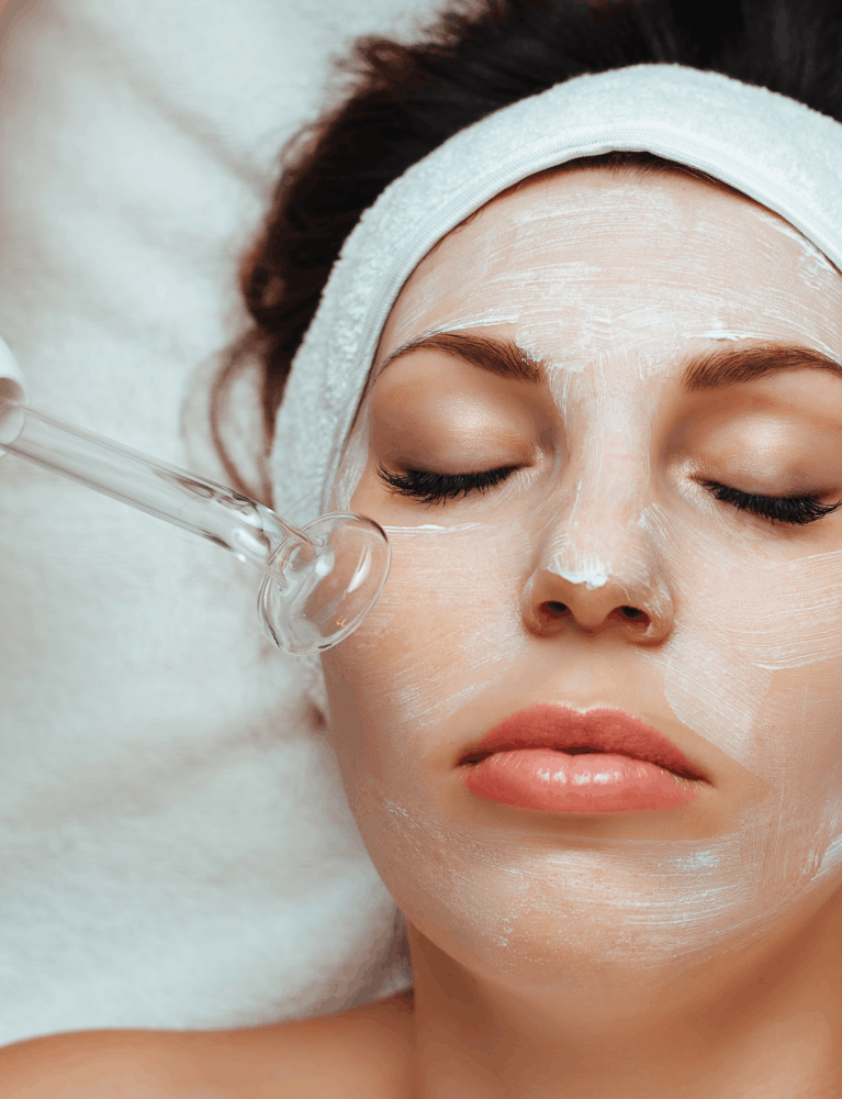Dermatologist performing an enzyme peel treatment on a patient at a skin clinic in Chennai.