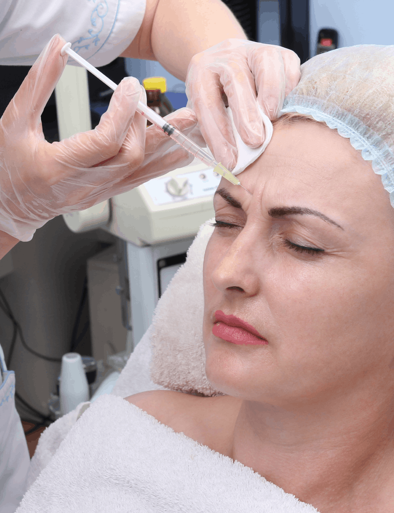 Dermatologist administering an intralesional steroid injection for a facial skin condition at a skin clinic in Chennai.
